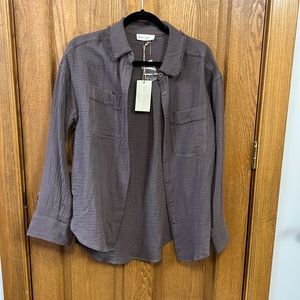 Brand new w/tags. Smoke free home. Oversized small with functional buttons